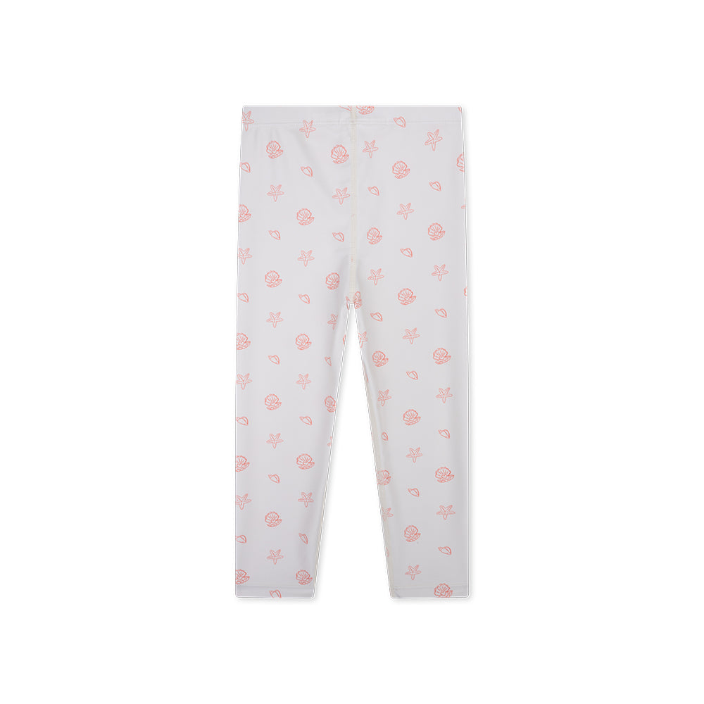 Old pink UV legging with pink seashell pattern on a white background