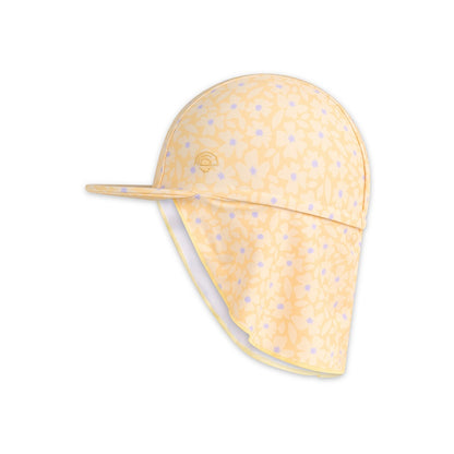 Yellow florish baby sun cap with a protective flap that shields the skin with purple polka dots on a white background
