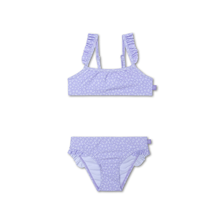 Purple bikini set with a white leopard print on a white background