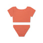 The back of a orange bikini set on a white background