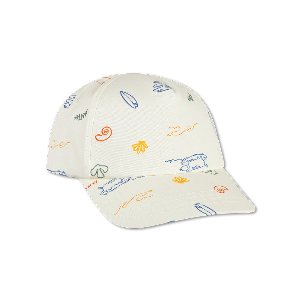 Beige cap with colorful sea patterns on a white background