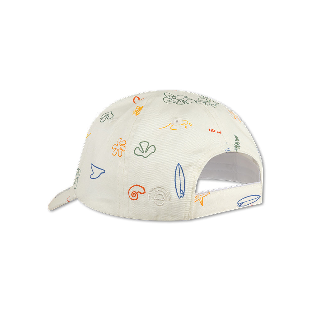 The back of a beige cap with colorful sea patterns on a white background