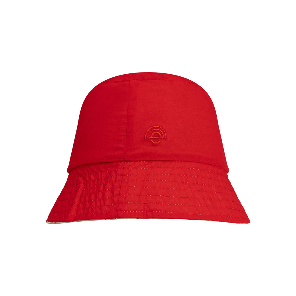 Red reversible hat with swim essentials logo on it on a white background
