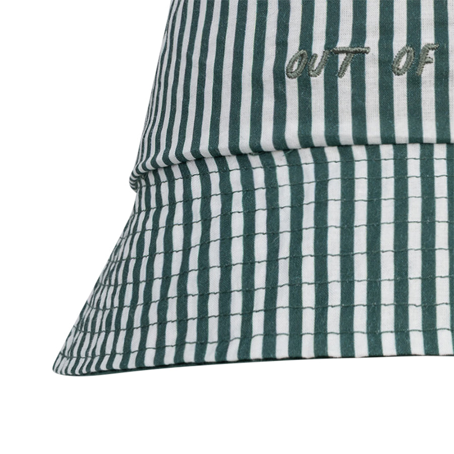 Green and white striped bucket hat with 'OUT OF' text on it on a white background