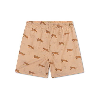Brown shorts with leopard pattern on a white background