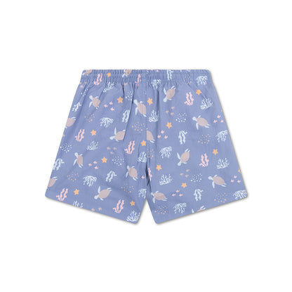 Blue shorts with sea turtle and starfish pattern on a white background