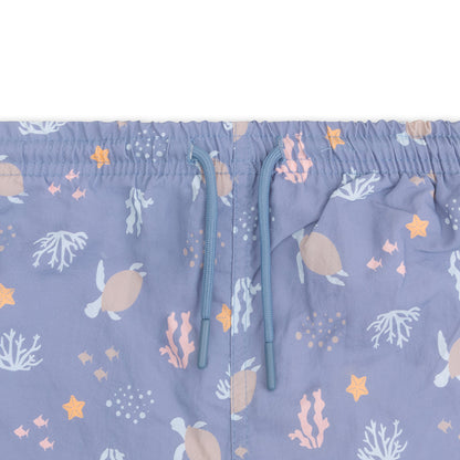 Children's shorts with an underwater pattern on a light purple background