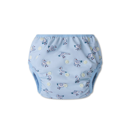 Blue swim diaper with seagull pattern on a white background