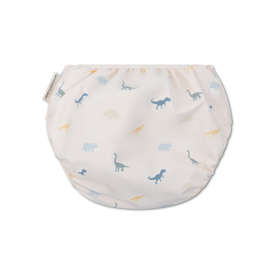 The back of a swim diaper with dinosaur pattern on a white background