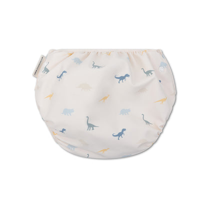 The back of a swim diaper with dinosaur pattern on a white background