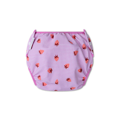 The back of a pink checkered swim diaper with strawberry pattern on a white background
