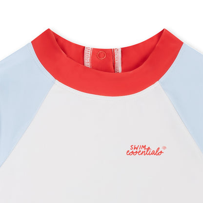 Close-up of a children's swimsuit with red collar and light blue sleeves on a white background.