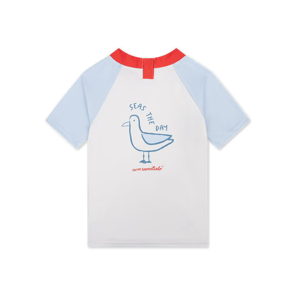 Children's t-shirt with a seagull design and 'Seas the Day' text on a white background