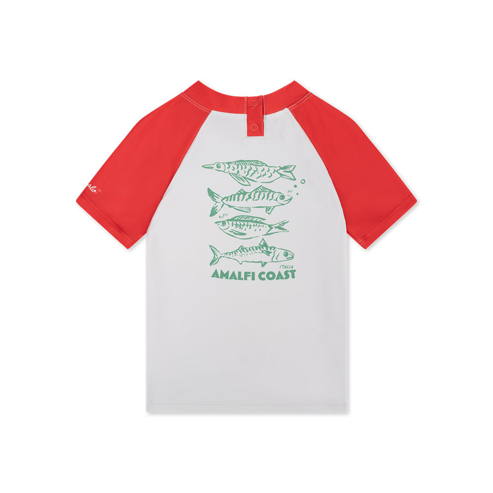 Children's t-shirt with red sleeves and white body, featuring green fish illustrations and 'Amalfi Coast' text on a white background.