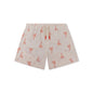 Beige swim shorts with red lobster pattern on a white background