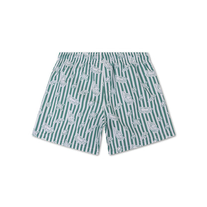 The back of green and white striped swim shorts with animal pattern on a white background