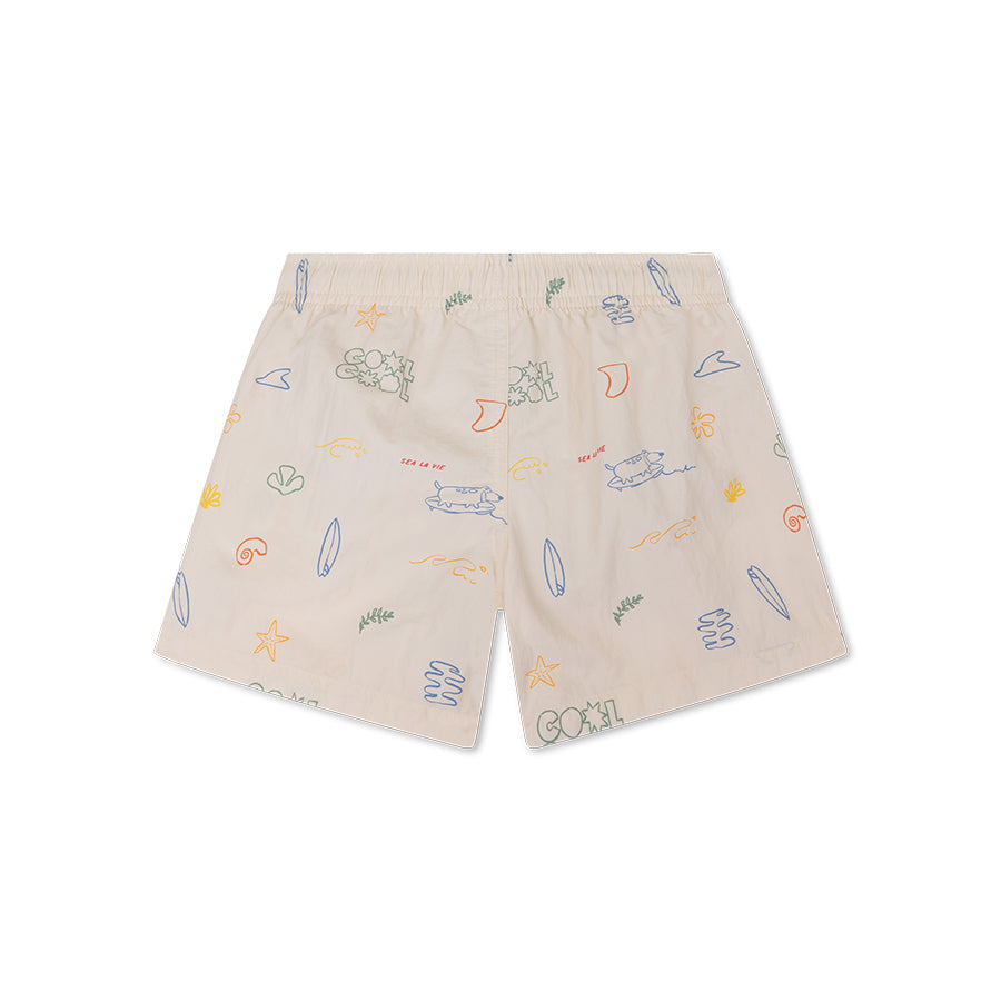 The back of beige swim shorts with colorful patterns on a white background
