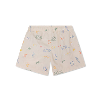 The back of beige swim shorts with colorful patterns on a white background
