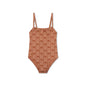 Brown one-piece swimsuit with palm tree pattern on a white background