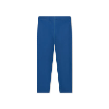 The back of a blue UV legging on a white background