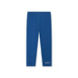 Blue UV legging with white swim essentials logo on it on a white background