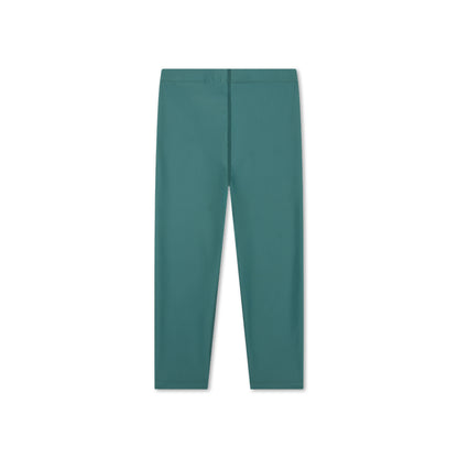 The back of a green UV legging on a white background