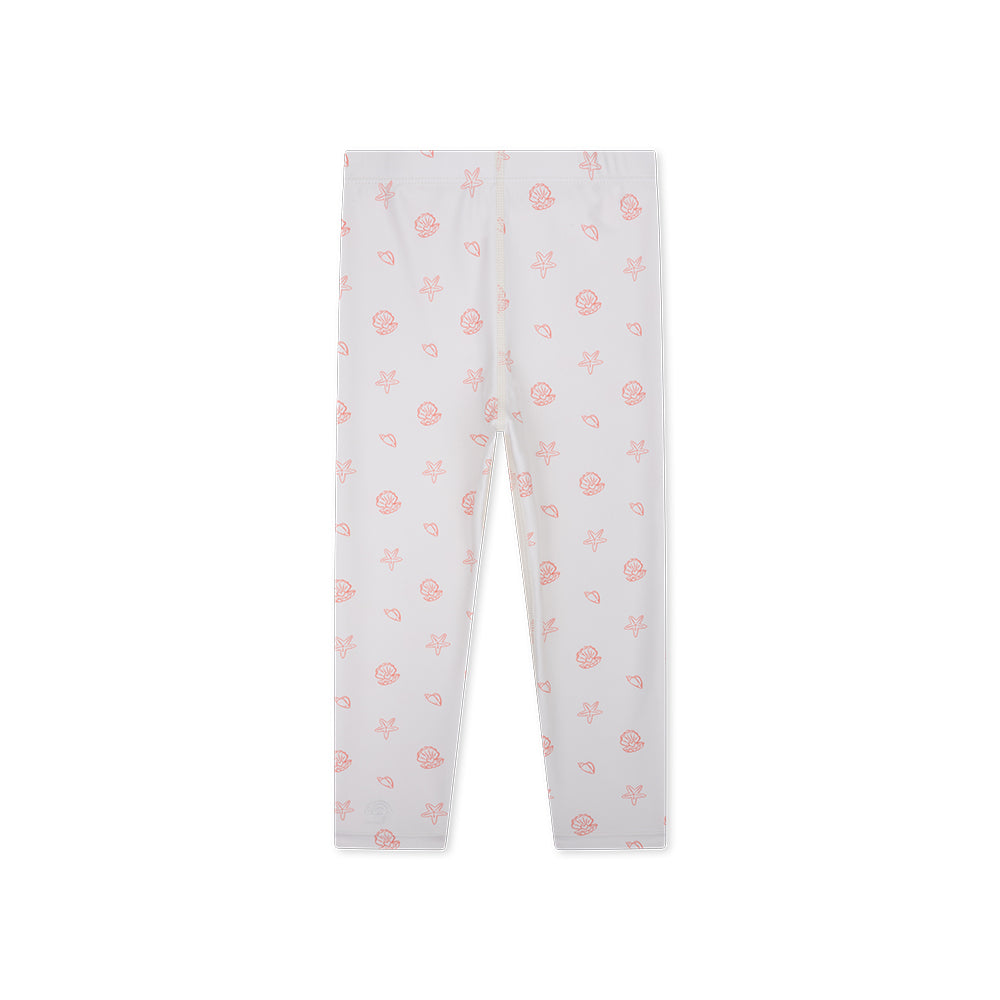 The back of an old pink UV legging with pink seashell pattern on a white background