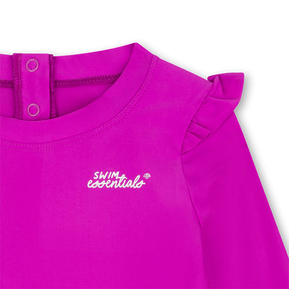 Close-up of a bright purple swimsuit with 'Swim Essentials' logo on a white background