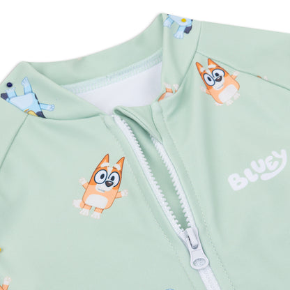 Light green children swimsuit Bluey with cartoon dog design and white zipper detail