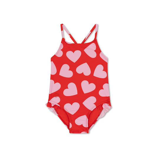 Red swimsuit with pink heart pattern on a white background