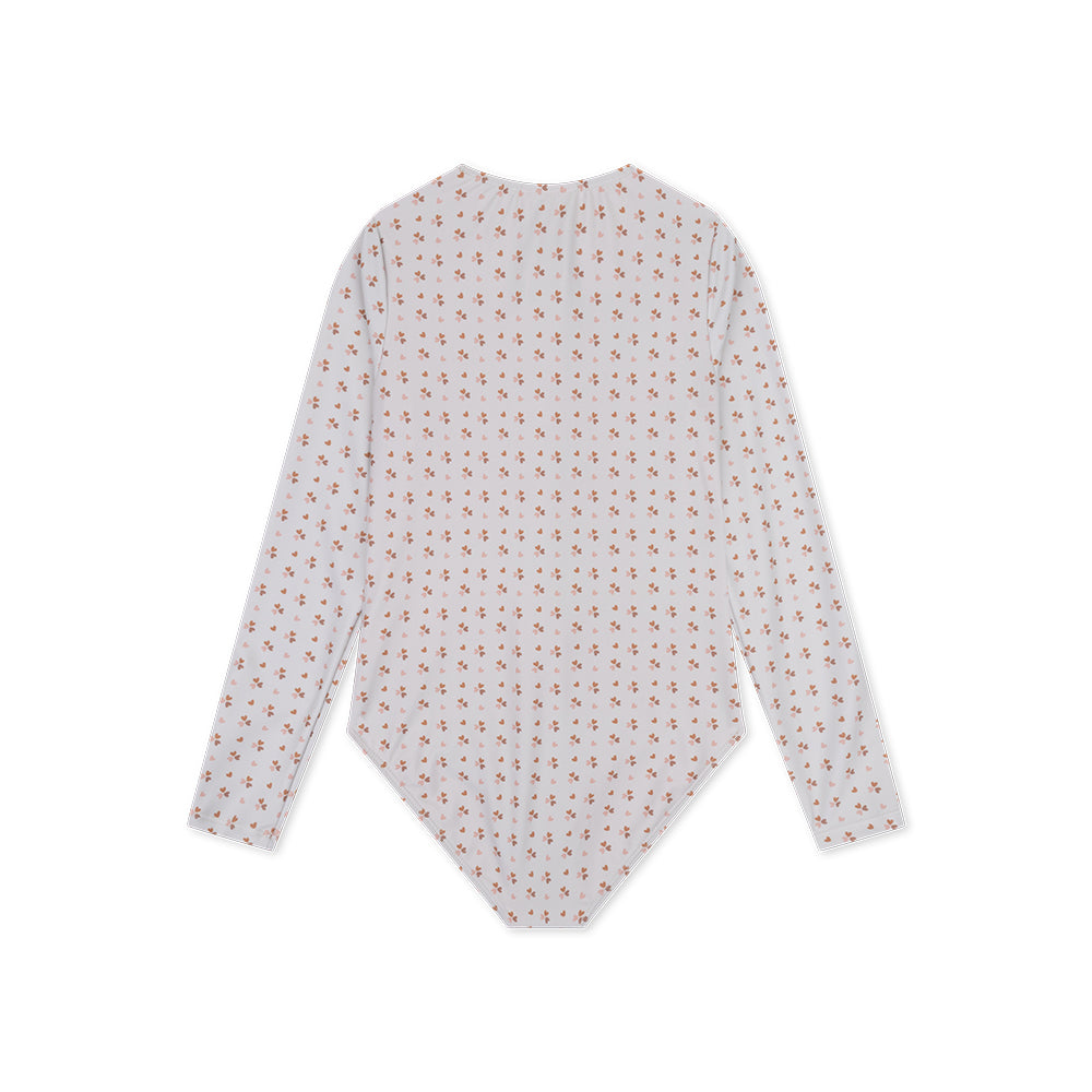 Heart-patterned long-sleeve swimsuit from the back on a white background
