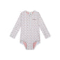 Children's long-sleeve swimsuit and a zip in the middle with little hearts pattern on a white background