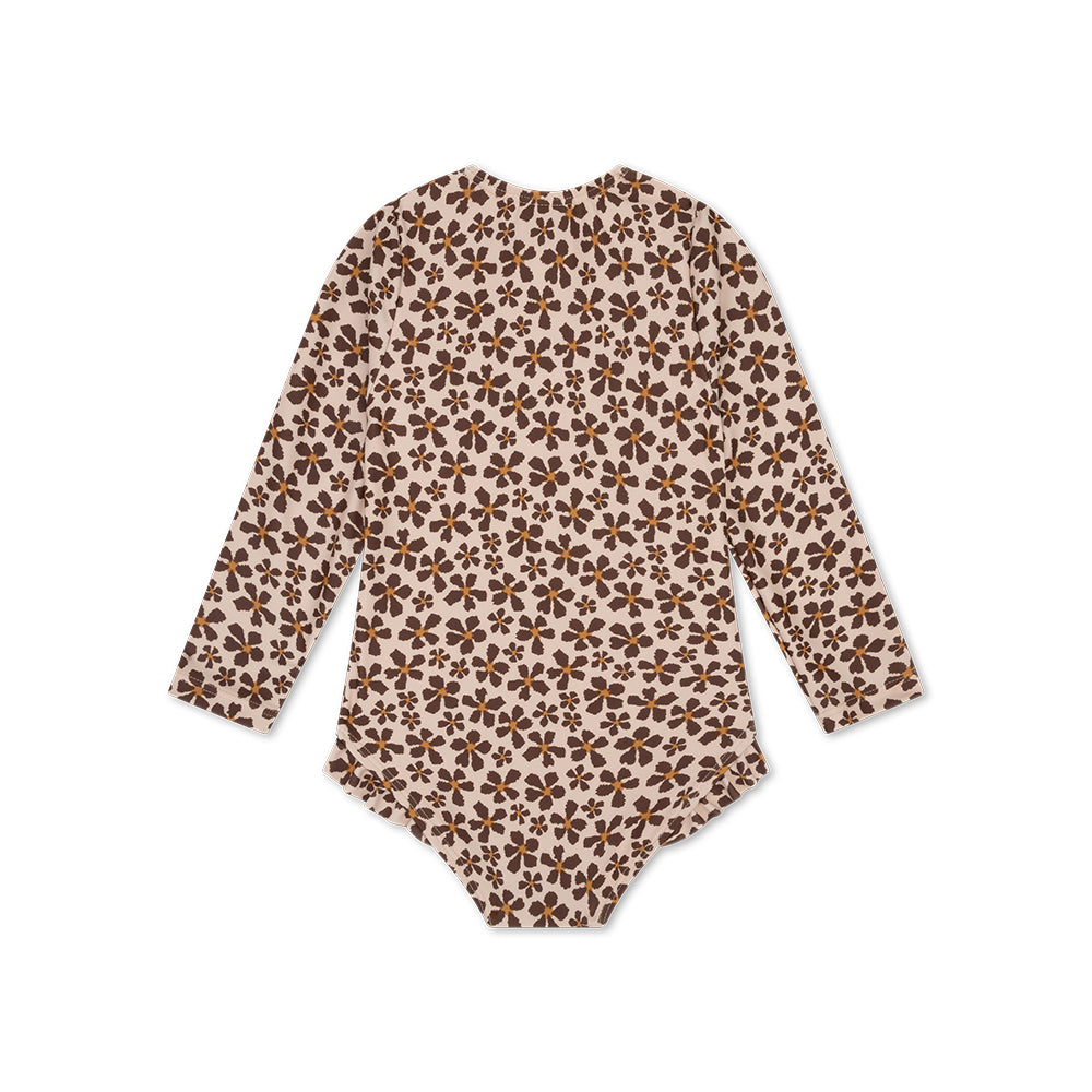 Wild Flower swimsuit with brown floral pattern on a white background
