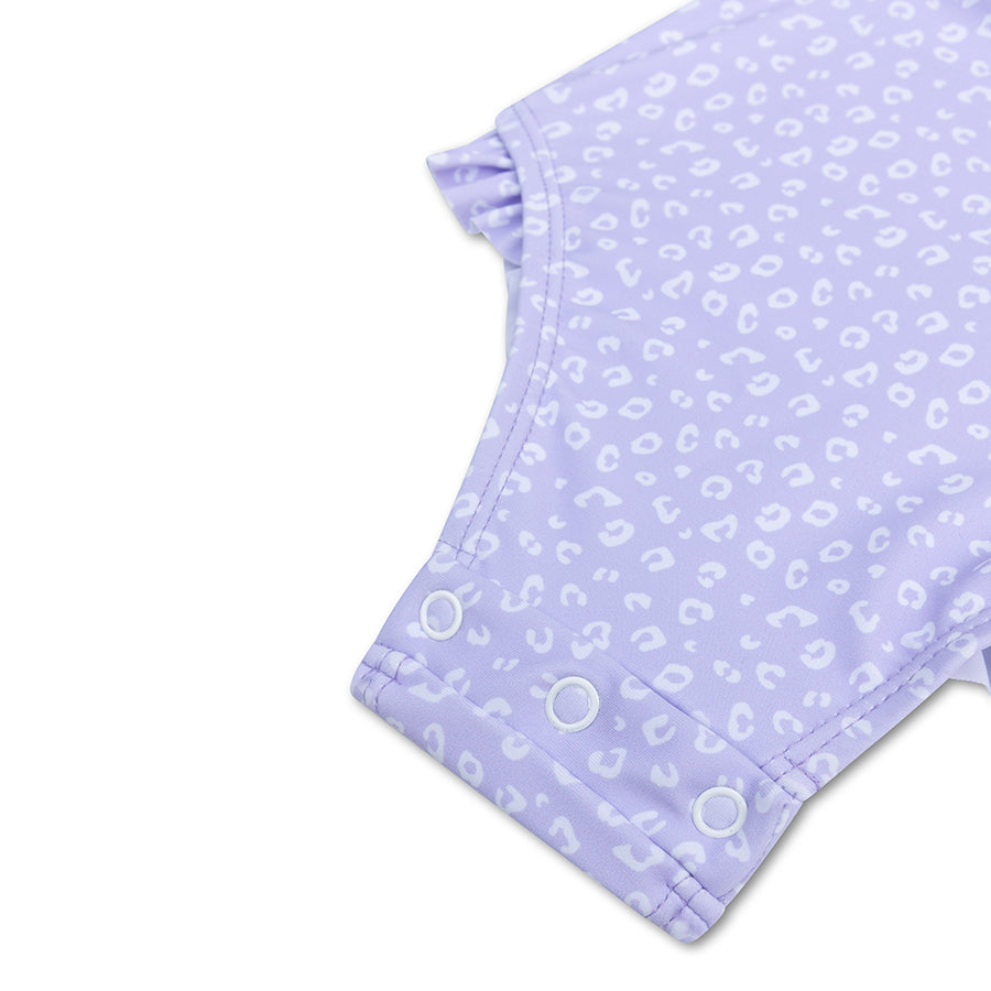 Light purple fabric with leopard print on a white background